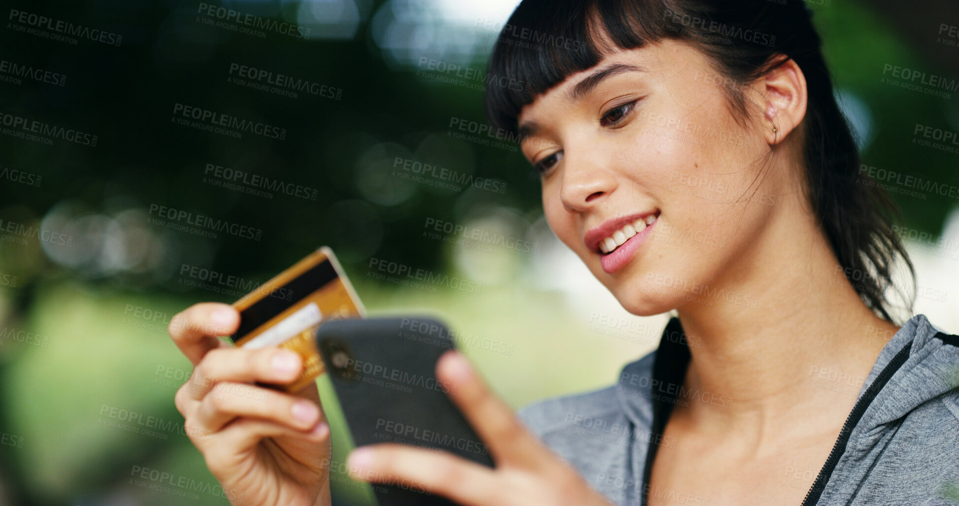 Buy stock photo Credit card, online shopping and phone with woman outdoor in garden for payment or purchase. Banking, ecommerce and smile with face of happy customer in park for buying, retail or spending money