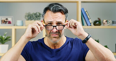 Buy stock photo Man, glasses and stress in portrait for optometry, eyesight or anxiety for myopia issue in home. Eye care, mature person or frustrated in living room with prescription lens, new frames or vision loss