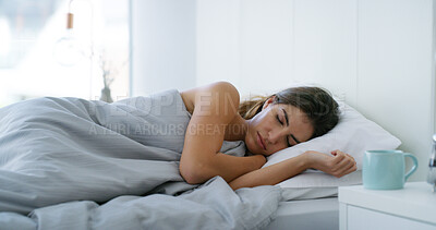 Buy stock photo Morning, relax and sleeping with woman in bedroom of home for recovery, resting or wellness on weekend. Comfortable, dreaming and napping with sleepy or tired person in apartment for time off