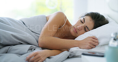 Buy stock photo Woman, relax and sleeping morning in home, comfortable and tired blanket in peaceful bedroom. Female person, lazy routine and weekend nap in apartment, serene dream and duvet fatigue for wellness