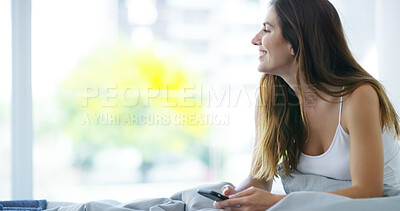 Buy stock photo Bedroom, thinking and woman with smartphone for chat, social media and online contact with smile. Home, female person and ideas with mobile for application, dating website and text message in morning