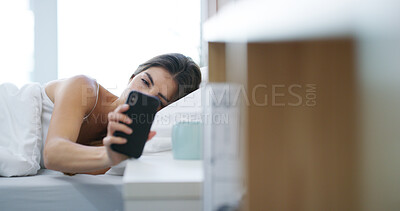Buy stock photo Home, woman and wake up with phone in bed for app alert, checking time and notifications in bedroom. Morning, person and smartphone in apartment for missed call, mobile alarm and reading text message