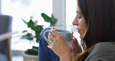Buy stock photo Woman, smell and drinking coffee in morning for comfort, dopamine and routine in house living room. Relax girl, cup and tea beverage with caffeine in home lounge for awake, alert and brain activity