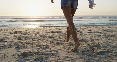 Buy stock photo Woman, legs and walking on beach for vacation, explore summer and travel to tropical island. Female person, ocean location and holiday in nature for wanderlust, feet and Bali adventure in sea sand