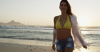 Buy stock photo Woman, walking and beach for holiday peace, explore summer and travel to tropical island. Female person, ocean location and vacation in nature for wanderlust, tourist and Bali adventure in portrait