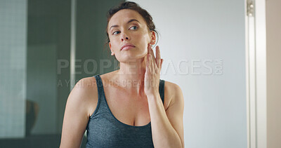 Buy stock photo Beauty, morning and routine with woman in bathroom of home for hygiene or natural skincare. Collagen, cosmetics and facial with reflection of person in mirror at apartment for dermatology wellness