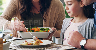 Buy stock photo Hands, healthy and mom with vegetables for child with family in home for eating vegan food, feast or meal. Salad, giving and girl with parents at apartment for bonding, lunch and social gathering
