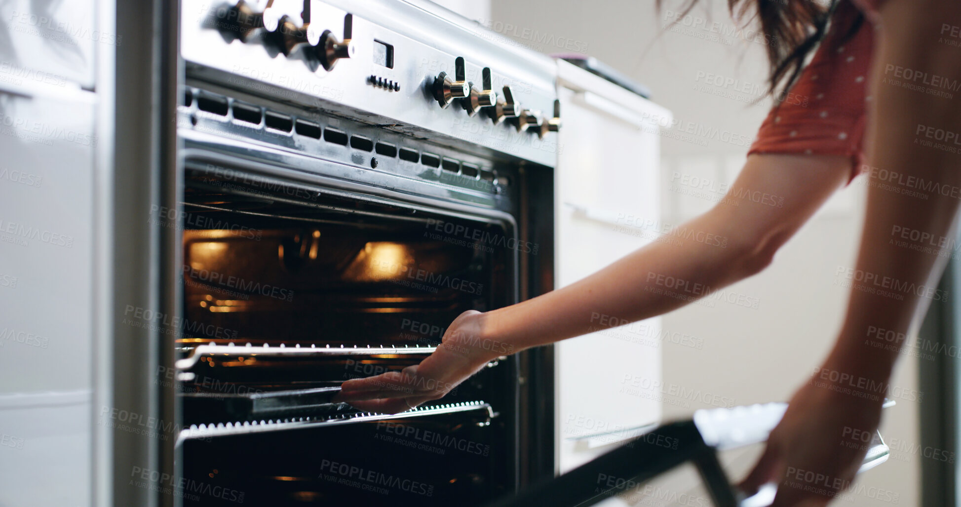 Buy stock photo Woman, hands and oven in kitchen for baking, recipe process and tray on rack in home. Female person, electric equipment and cooking at stove for meal prep, diet care and nutrition in homemade food