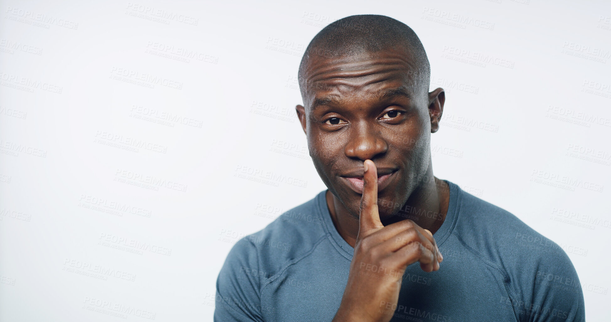 Buy stock photo Health, portrait and black man with fitness secret for workout, wellness and mockup in studio space. Privacy, gossip and personal trainer with smile, confidential exercise tips and white background