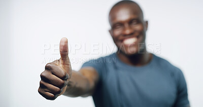 Buy stock photo Thumbs up, fitness and hand of black man in studio for workout, exercise and training on white background. Sports, gesture and happy person with success emoji for agreement, thank you and approve