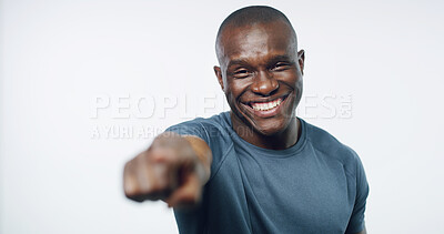 Buy stock photo Exercise, pointing and portrait with black man in studio for fitness, health or wellness challenge. Choice, decision and vote with happy athlete on white background for membership or recruitment