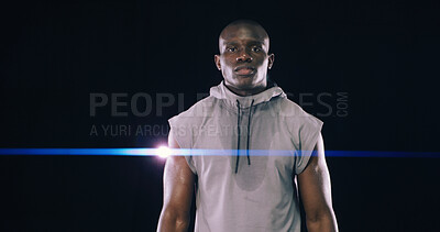 Buy stock photo Portrait, black man and hoodie of fitness in studio of bodybuilding, strength workout and growth results. Athlete, lens flare and pride of competition, boxing training and wellness on dark background