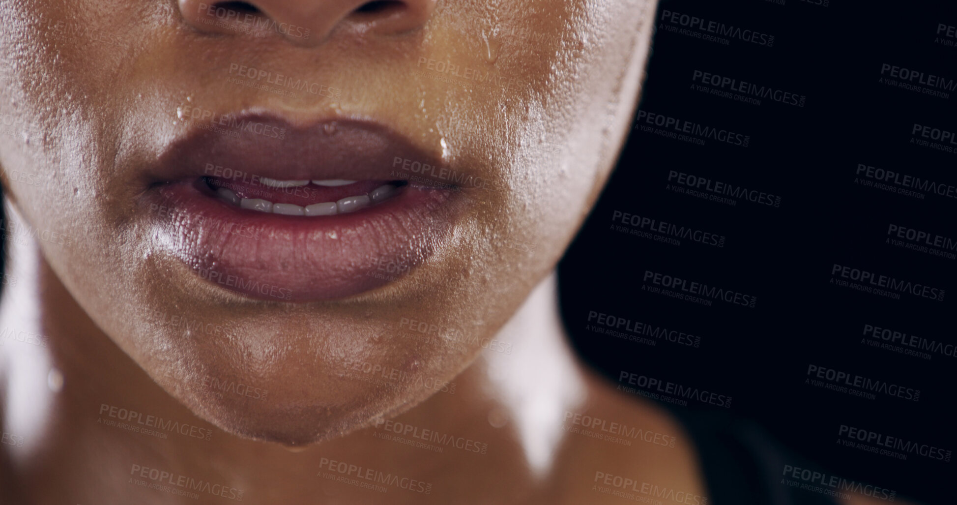 Buy stock photo Mouth, sweating and person in gym, fitness and deep breathing for exercise, studio and training for health. Black background, lips and body temperature regulation for athlete, workout and wellness
