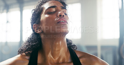 Buy stock photo Fitness, fatigue and woman sweating in gym on break for intense workout, exercise recovery or breathing. Rest, face and tired athlete relax in sports club for wellness, health challenge or training