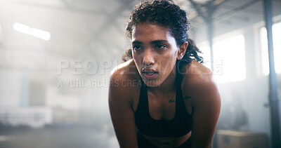 Buy stock photo Fitness, thinking and tired woman resting in gym for intense workout, fatigue or exercise recovery. Break, sweating and athlete breathe to relax in sports club for wellness, body health or training
