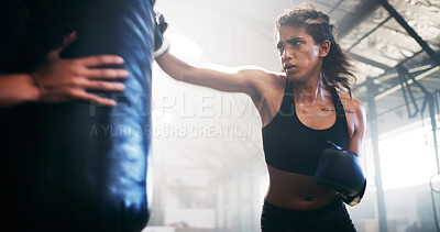 Buy stock photo Fitness, kickboxing and woman in gym for workout, challenge or competition with strength. Sports, practice and female person with coach for cardio training or exercise in health club for activity.