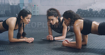 Buy stock photo Fitness, plank and power with woman friends on floor of gym together for training or workout. Balance, exercise and strength with group of athlete people in health club for challenge or performance