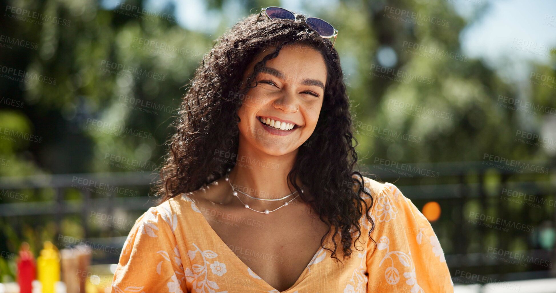 Buy stock photo Woman, portrait and smile outdoor at restaurant for summer holiday, relax and confidence. Person, girl and happy at cafe on vacation for fun break, enjoyment and wellness with pride and positivity