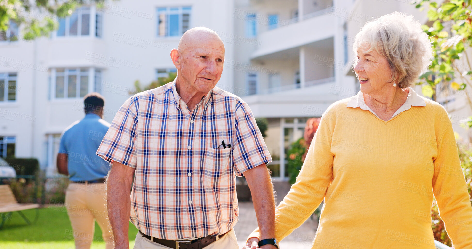 Buy stock photo Happy, elderly couple and holding hands with love at retirement home for bonding, care or support. Senior man, woman or pensioners with smile for date, walk or fresh air together at outdoor garden