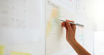 Writing, calendar and schedule with hands of person in office for to do list, planning and appointment. Agenda, reminder and deadline checklist with closeup of woman for project, date and task