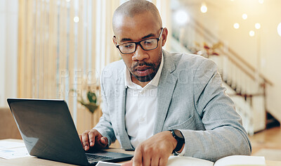 Buy stock photo African man, laptop and documents at office with finance, review and charts with report at interior design startup. Person, notes and computer for accounting, sales or profit at renovation company