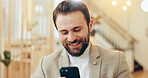 Businessman, phone and happy in office for news, communication and stock market update. Trader, mobile or smile at bokeh for online bank notification, exchange rate increase or investment opportunity