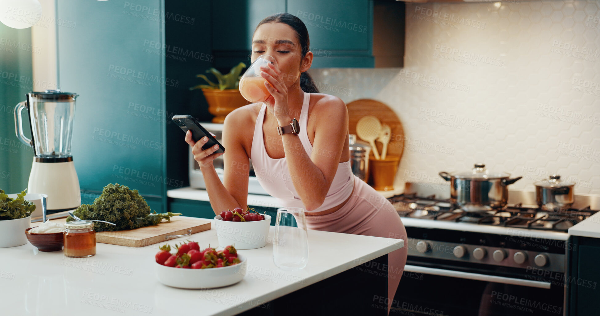 Buy stock photo Phone, kitchen and woman drinking smoothie in home for health, wellness and liquid breakfast. Nutrition, health and female person enjoying organic fruit juice for detox, cleanse or weight loss.