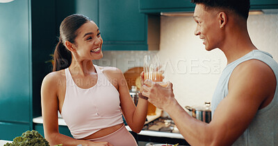 Buy stock photo Healthy, kitchen and couple with smoothie, cheers and happy for diet in home, nutritionist and smile. House, man and woman with drink for protein, bonding and people with liquid for detox or vitamins