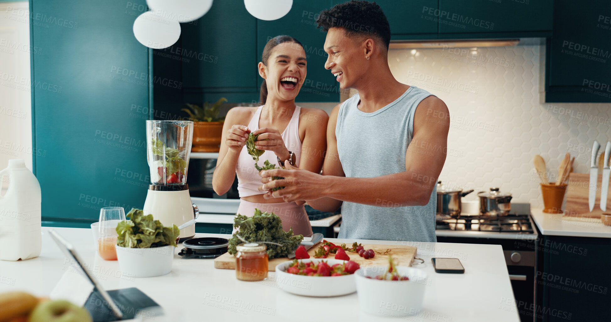 Buy stock photo Laugh, ingredients and couple with smoothie in kitchen for diet, health and wellness together. Love, happy and young woman and man with vegetables and fruit for nutrition juice breakfast in home.
