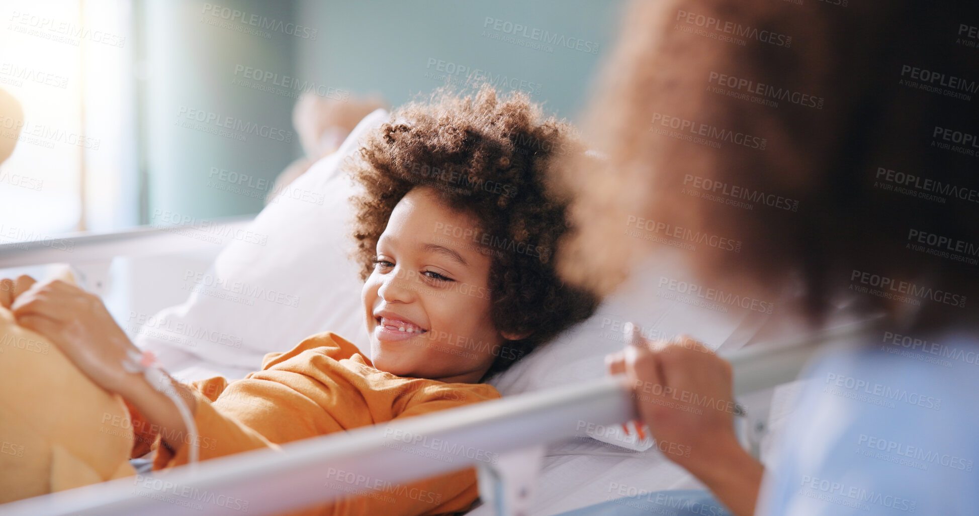 Buy stock photo Kid, mother and smile in hospital bed with teddy bear for healthcare, medical support or surgery recovery. Mom, sick child and happy patient with toy for play, hand and healing illness with family