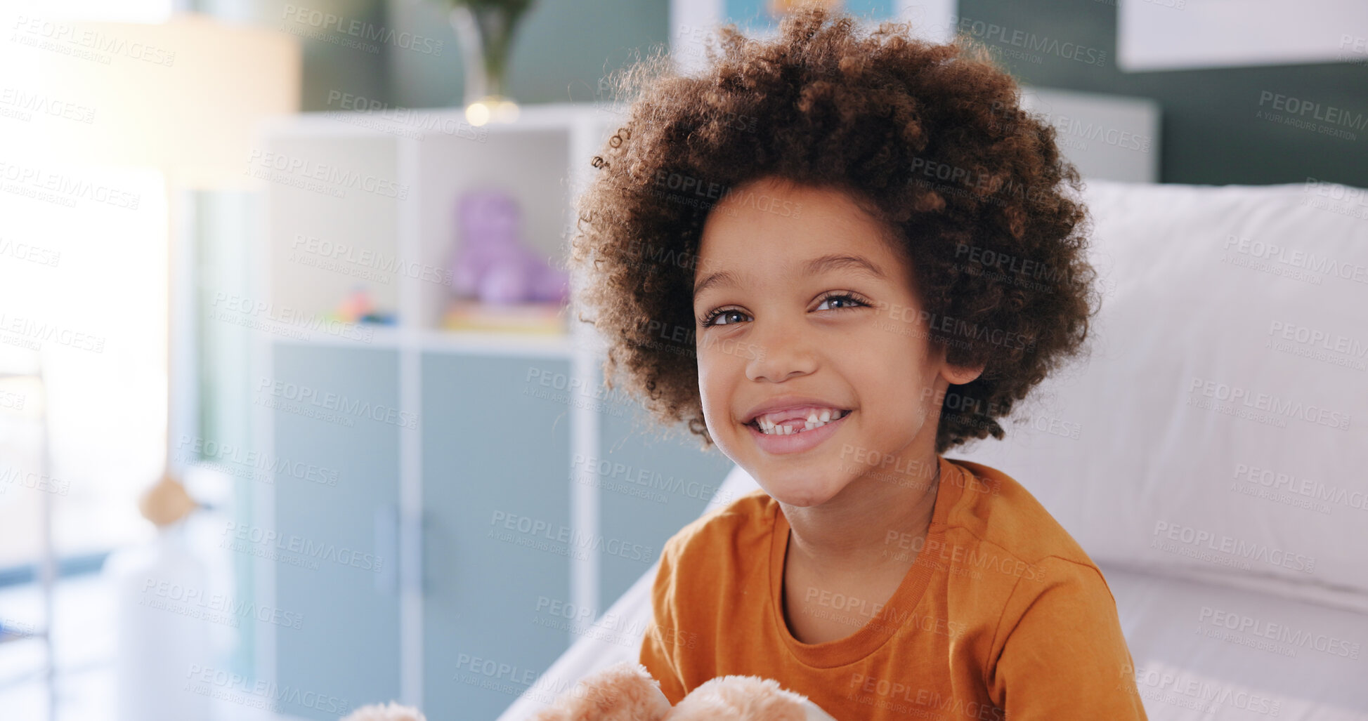 Buy stock photo Happy boy, portrait and childcare with smile for health, care or wellness at hospital appointment. Face, afro or male kid with confidence at pediatric clinic for illness, youth or chronic treatment