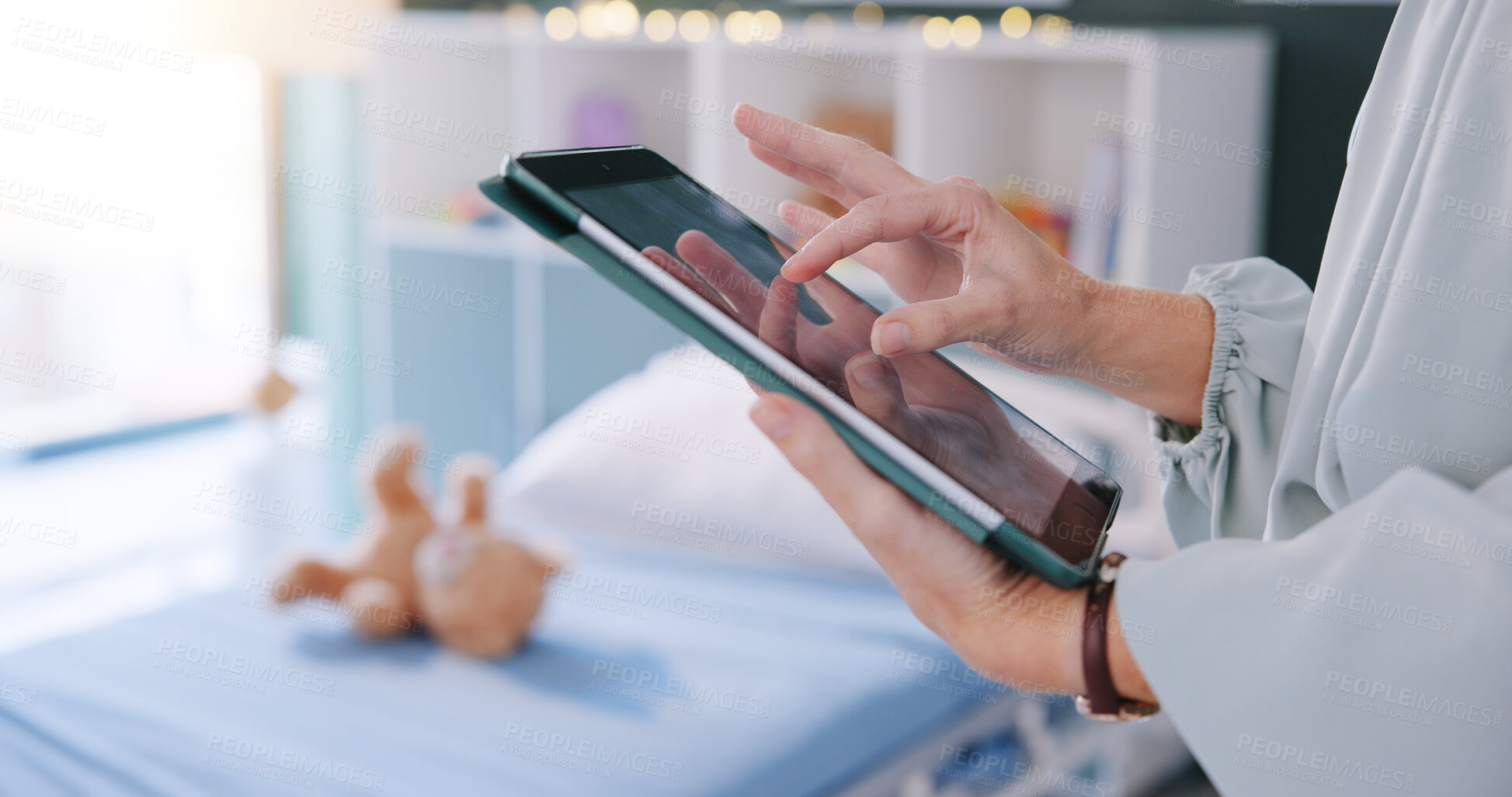 Buy stock photo Person, pediatrician and hands with tablet for childcare research, youth development or medical results at clinic. Closeup, child specialist or practitioner with technology for schedule treatment