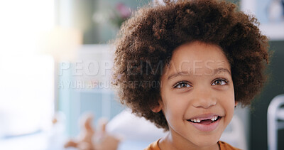 Buy stock photo Happy boy, face and childcare with dream for health, care or wellness at hospital appointment. Young, male person or kid with smile or afro at clinic for childhood illness, youth or chronic treatment