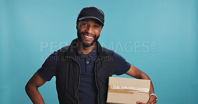 Buy stock photo Portrait, courier and happy black man with package in studio for ecommerce, logistics or supply chain. Face, delivery and box for distribution, shipping or online shopping on blue background in Kenya
