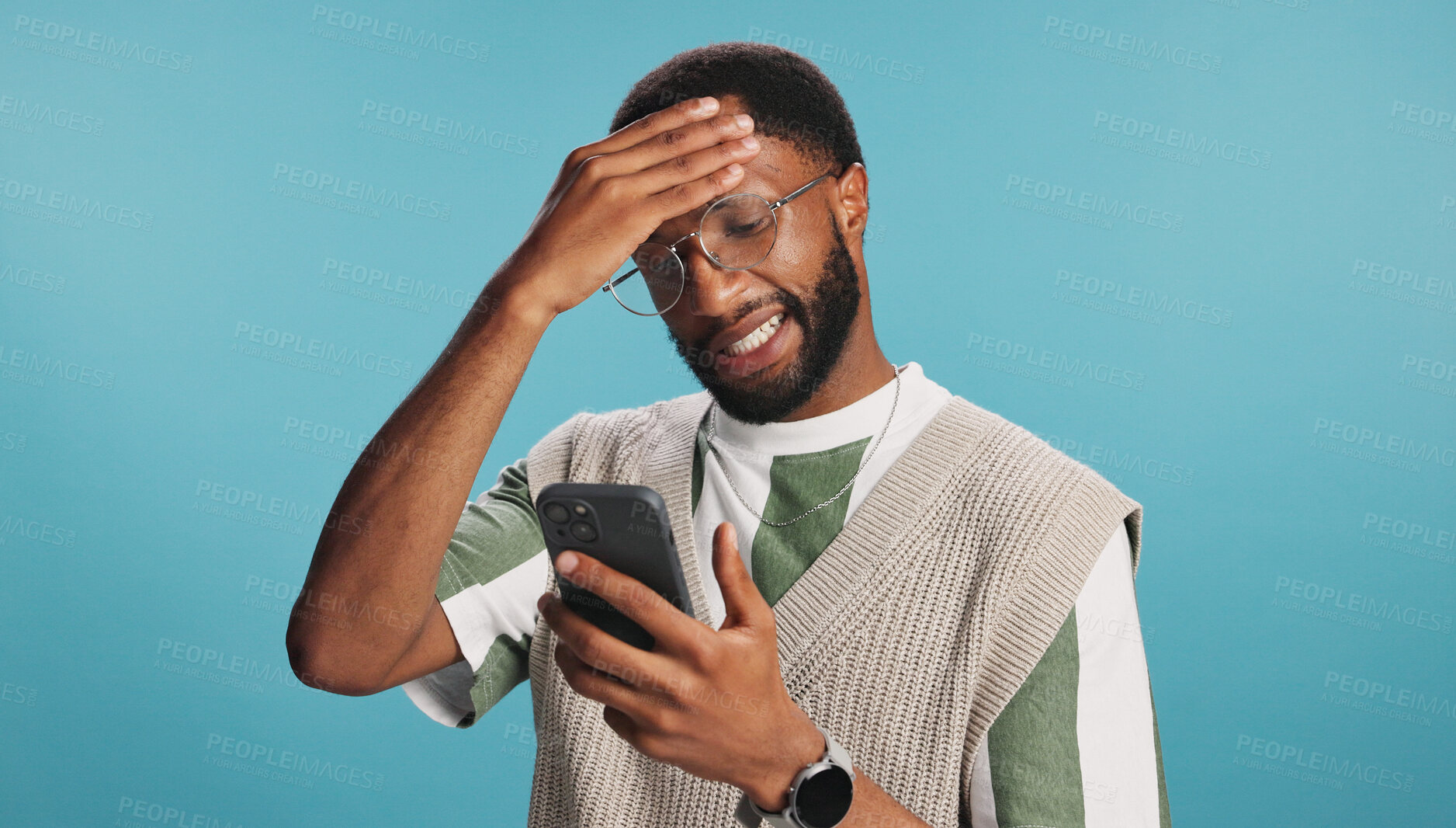 Buy stock photo Fail, stress or black man with phone for reading bad news, password error or online crisis in studio. Anxiety, hacked or frustrated person by blue background for scam, digital fraud or notification