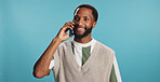 Happy, phone call and black man in studio, smile and communication on blue background. African person, guy and model with smartphone, mobile user and conversation with network, digital app and chat