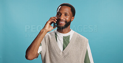Buy stock photo Happy, phone call and black man in studio, smile and communication on blue background. African person, guy and model with smartphone, mobile user and conversation with network, digital app and chat