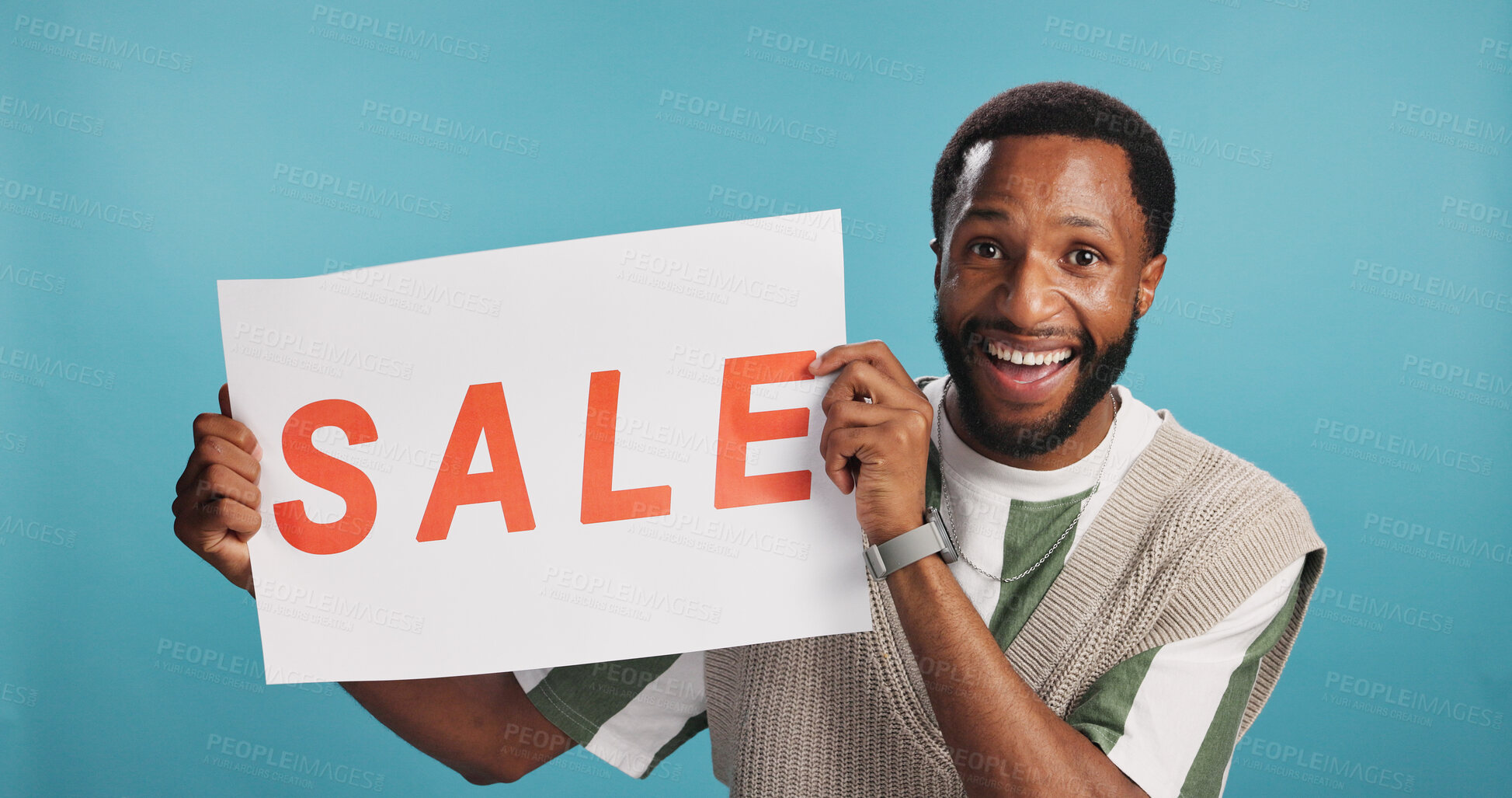 Buy stock photo Portrait, sale poster and black man with smile, opportunity and promotion on blue studio background. African person, model and guy with options, billboard and excited with banner and announcement
