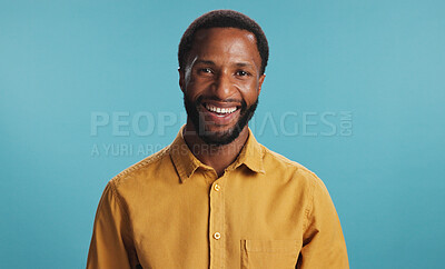 Buy stock photo Happy, portrait and man with smile, studio and positive mindset for career growth, creative and business. Blue background, mockup space and black person with confidence, writer or freelancer in Kenya