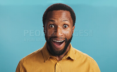 Buy stock photo Surprised, portrait and man with smile, studio and shocked by career growth, creative and business. Blue background, wow and black person in mock up space, writer and happy for opportunity in Kenya
