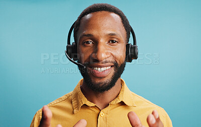 Buy stock photo Black man, headset and call centre portrait in studio, hotline employee and blue background. Male person, telemarketing consultant and helping with customer care, professional service and advisor