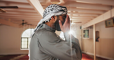 Buy stock photo Religion, Muslim and man in Mosque for praying, worship and faith in religious building. Spiritual, Allah and person with prayer hands for Ramadan Kareem, culture and Islamic belief in Saudi Arabia