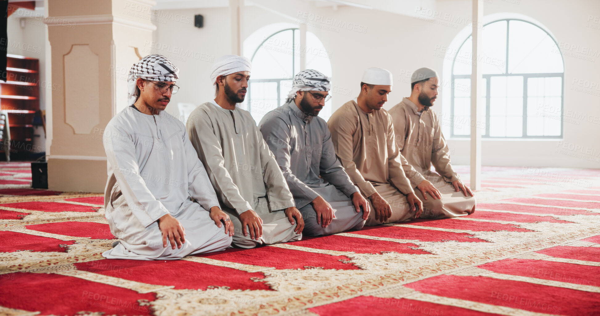 Buy stock photo Mosque, Islam and Muslim men for praying, worship and faith in religious building. Spiritual, Allah and people kneel for Ramadan Kareem blessing, prayer and Islamic belief in Saudi Arabia temple