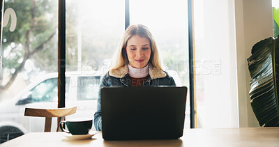 Buy stock photo Woman, laptop and happy for remote work at cafe, drink or cappuccino with freelance copywriting job. Person, computer and reading with tea cup for review, project or editing process at coffee shop