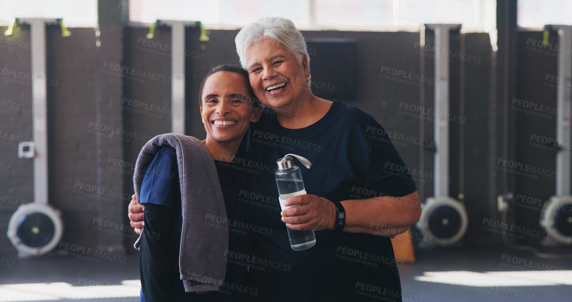 Buy stock photo Portrait, hug and old women in gym, fitness and smile with support, motivation and goals. Face, senior people and friends in wellness center, water bottle and happiness with training, joy and healthy
