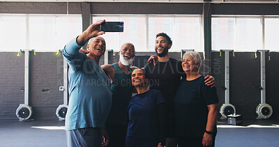 Buy stock photo Mature people, personal trainer and selfie in gym for friends, workout or training. Physical therapy, support and coach with team building for retirement, fitness class or senior club profile picture