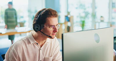 Buy stock photo Business, call center and man with computer, telemarketing and customer support in modern office. Person, employee and consultant for insurance company, headset and online reading for client info