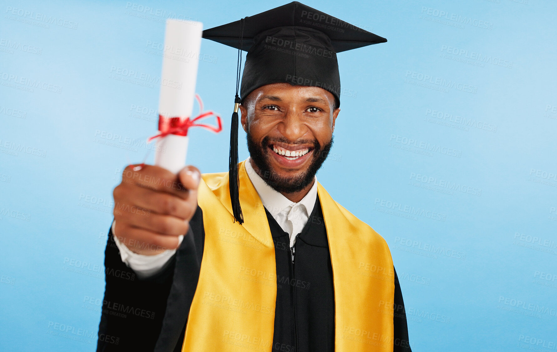 Buy stock photo Portrait, black man and diploma for graduation in studio with celebration, education success and achievement. Smile, student and certificate with university award, announcement and blue background