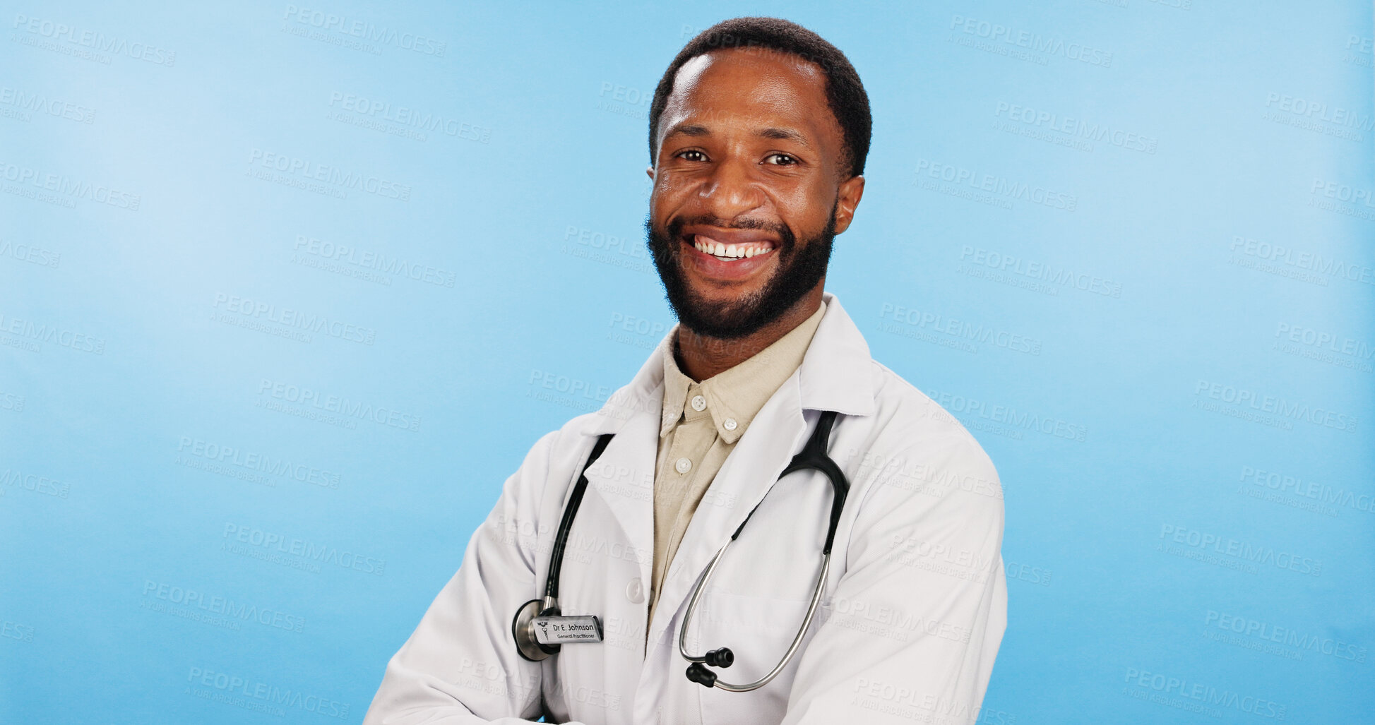 Buy stock photo Portrait, doctor and black man with arms crossed in studio, healthcare and employee on blue background. African person, face and medical with professional, pride and confidence with gp and lab coat