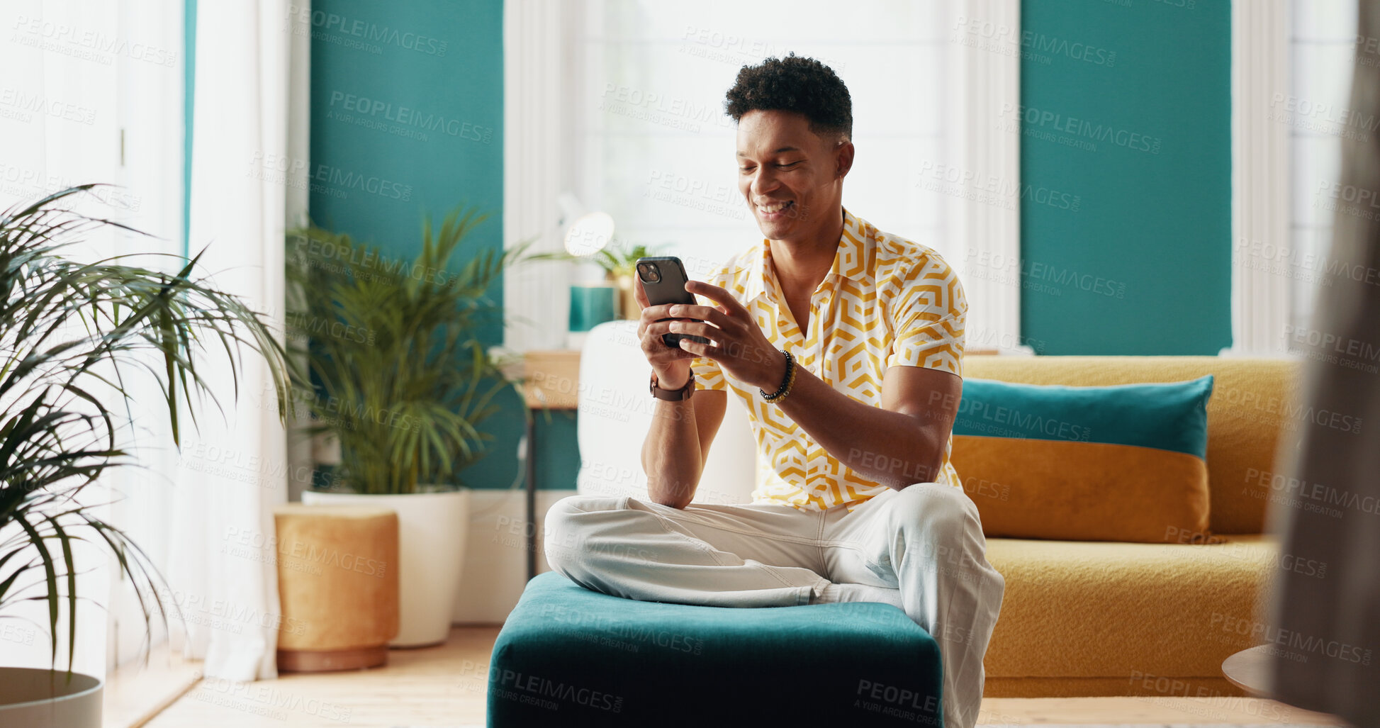 Buy stock photo Happy, man and student with phone at home of education results, university application and acceptance. Male person, mobile and good news for enrollment, scholarship feedback and approval notification